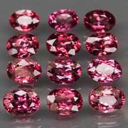Ravishing 13.53ct violet pink Rhodolite Garnet set