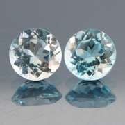 Heavy 4.56ct vivid sky blue Topaz set