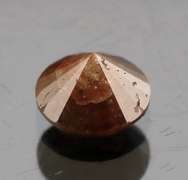 Eye catching 1.25ct round cut earth tones Diamond solitaire