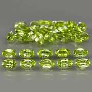 Dazzling 8.55ct untreated apple green Peridot set