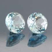 Heavy 4.56ct vivid sky blue Topaz set