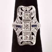 Fantastic Approx. 0.59CTW Diamond and 0.12CTW Sapphire Ring in Platinum