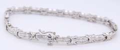 Sparkling White Gold Baguette Station Link Bracelet