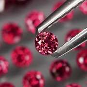 Premium diamond cut 7.54ct Rhodolite Garnet set