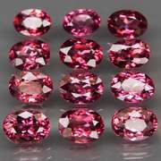 Ravishing 12.77ct violet pink Rhodolite Garnet set