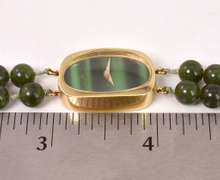 Brilliant Baume & Mercier Jade Bead Bracelet in 14K Yellow Gold