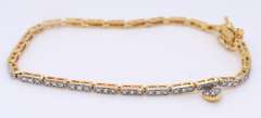 Sterling Silver Cubic Zirconia Bracelet with Tiny Heart Shaped Charm