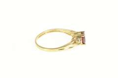 10K Yellow Gold Oval Syn. Ruby CZ Accent Classic Statement Ring