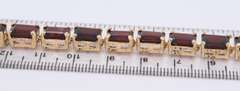 Majestic Yellow Gold Garnet Emerald Cut Bracelet