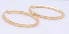 Beautiful Yellow Gold oval  Hoop Earrings