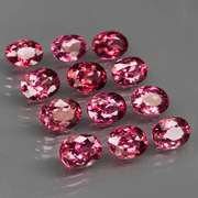 Ravishing 13.53ct violet pink Rhodolite Garnet set