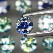 Heated only! 3.14ct round cut Australian Sapphire set