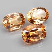 Matched! 3 piece 23.76ct full fire Imperial Topaz set