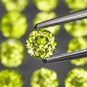High grade 9.03ct untreated apple green Peridot set