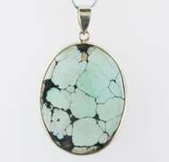 Striking well marbled 52.84ct Turquoise cabochon sterling pendant