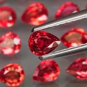 Excellent 4.47ct set of pear cut red Imperial Sapphires