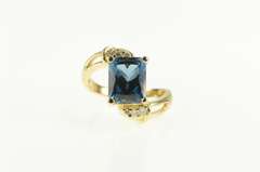 14K Yellow Gold Emerald Cut Blue Topaz Diamond Bypass Ring