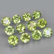 High grade 6.68ct untreated apple green Peridot set