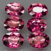 Amazing 9.90ct oval cut violet pink Rodolite Garnet set