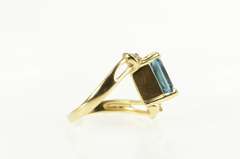 14K Yellow Gold Emerald Cut Blue Topaz Diamond Bypass Ring