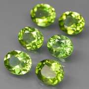 Ravishing 7.38ct untreated lime green Peridot set