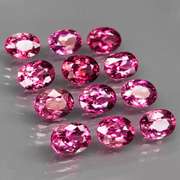 Remarkable 13.19ct violet pink Rhodolite Garnet set