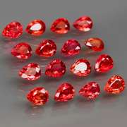 Excellent 4.47ct set of pear cut red Imperial Sapphires