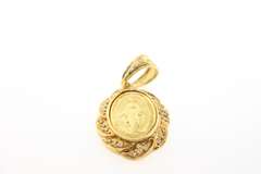 Radiant 18kt Gold Diamond Religious Pendant