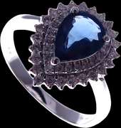 Wonderful Sapphire 18k White Gold Ring drenched in Diamonds