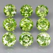 High grade 8.25ct untreated apple green Peridot set