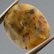 Super unique calico 13.44ct faceted Sapphire