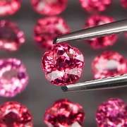 Ravishing 5.47ct violet pink flower shape Rhodolite Garnet set