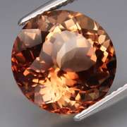 Impressive 8.14ct full fire Imperial Topaz solitaire