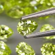 Dazzling 8.20ct untreated apple green Peridot set