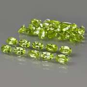 Dazzling 8.55ct untreated apple green Peridot set