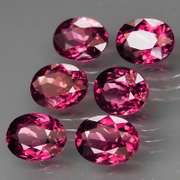 Amazing 9.90ct oval cut violet pink Rodolite Garnet set