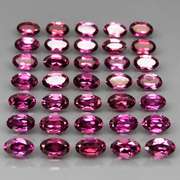 Ravishing 9.99ct violet Rhodolite Garnet set