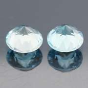 Heavy 4.56ct vivid sky blue Topaz set