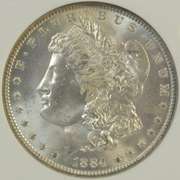 Blazing-white near Gem BU 1884-O Morgan Silver Dollar. NGC MS64