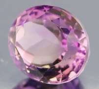 Glittering oval cut 11.12ct violet Amethyst