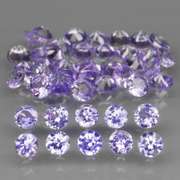 Heavy flashing 4.81ct diamond cut Tanzanite set