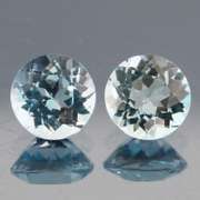 Matched 4.56ct pair of glittering sky blue Topaz