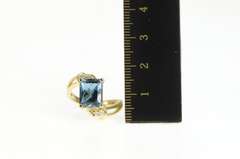 14K Yellow Gold Emerald Cut Blue Topaz Diamond Bypass Ring
