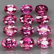 Remarkable 13.19ct violet pink Rhodolite Garnet set
