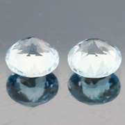 Matched 4.56ct pair of glittering sky blue Topaz