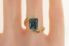 14K Yellow Gold Emerald Cut Blue Topaz Diamond Bypass Ring