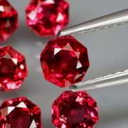 Amazing 3.56ct octagon cut violet red Garnet set