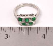 Tasteful Approx. 0.65CTS Emerald and 0.71CTS Diamond Ring in Platinum