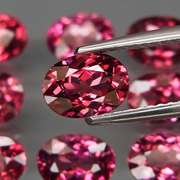 Ravishing 12.77ct violet pink Rhodolite Garnet set