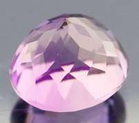 Glittering oval cut 11.12ct violet Amethyst